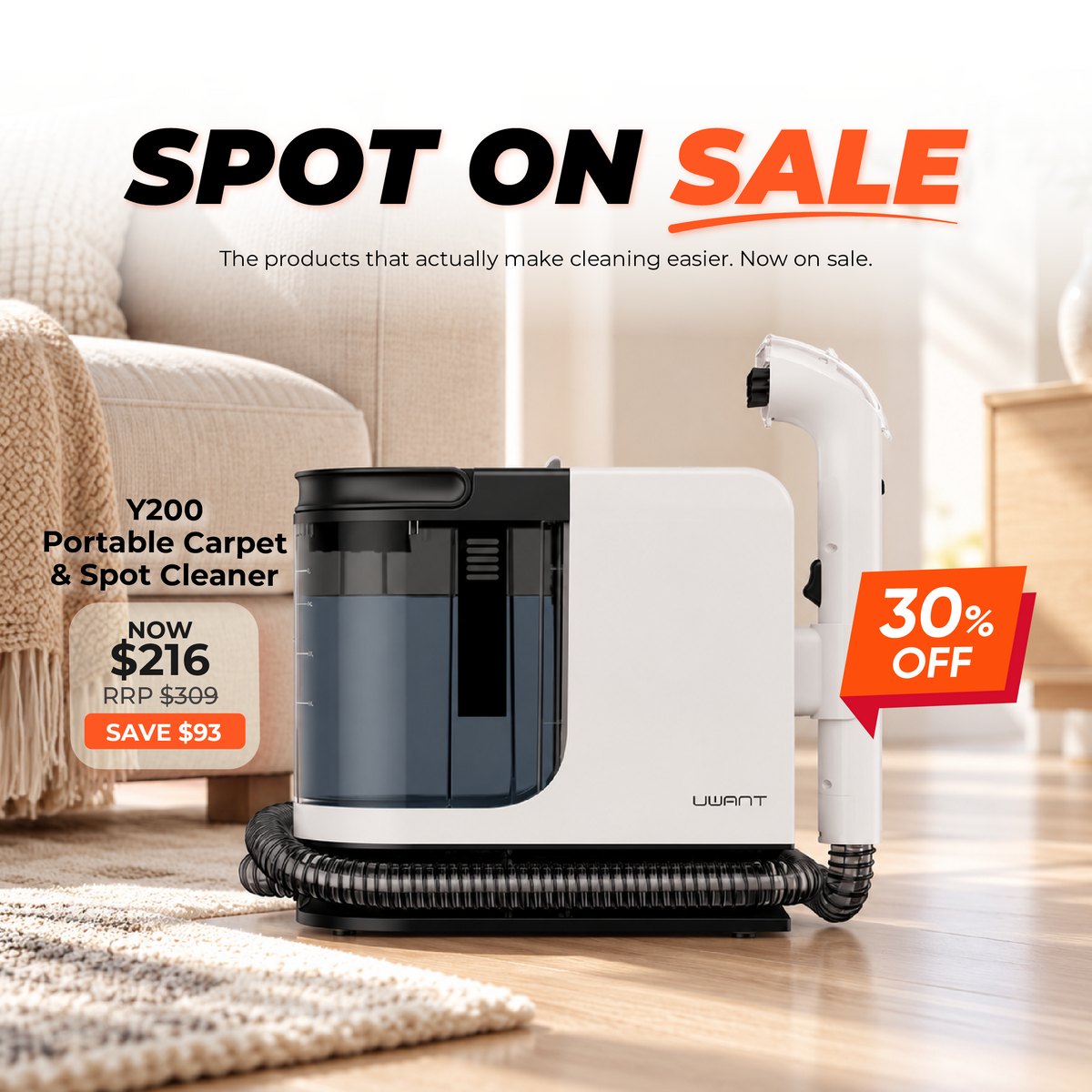 Portable carpet spot cleaner with white wand and black base